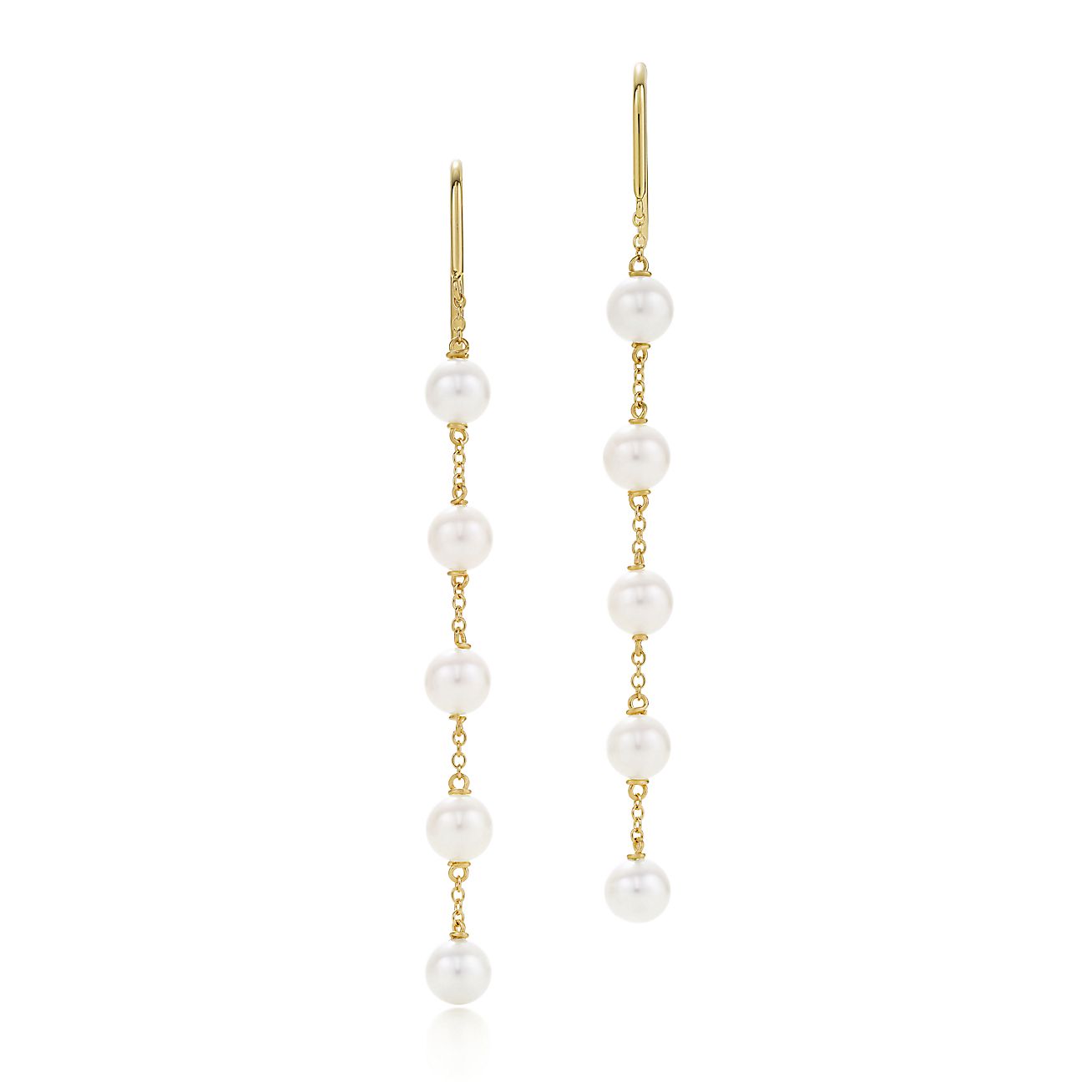 Elsa Peretti® Pearls by the Yard™ hook earrings in 18k gold. | Tiffany ...