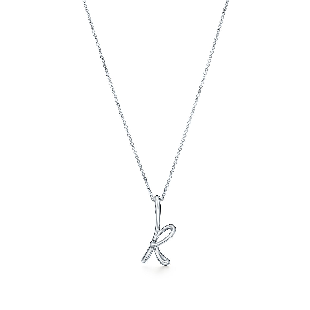 Elsa Peretti® letter pendant. Sterling silver, small. Letters A-Z available. | Tiffany & Co.