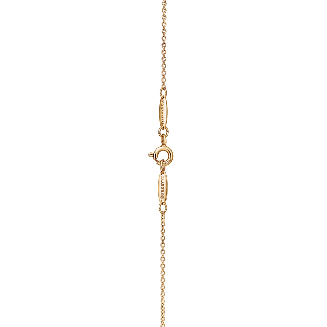 Elsa Peretti® Bean® design Pendant in Yellow Gold, 6.5 mm - Alternate shot 1 - Alternate shot 2 - Alternate shot 3