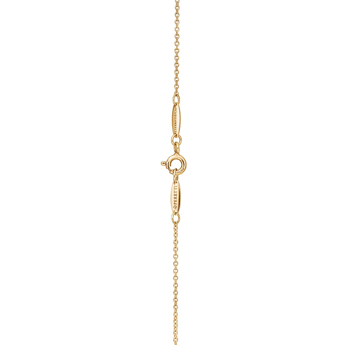 Elsa Peretti® Open Heart Pendant in Yellow Gold, 11 mm - Alternate shot 1 - Alternate shot 2
