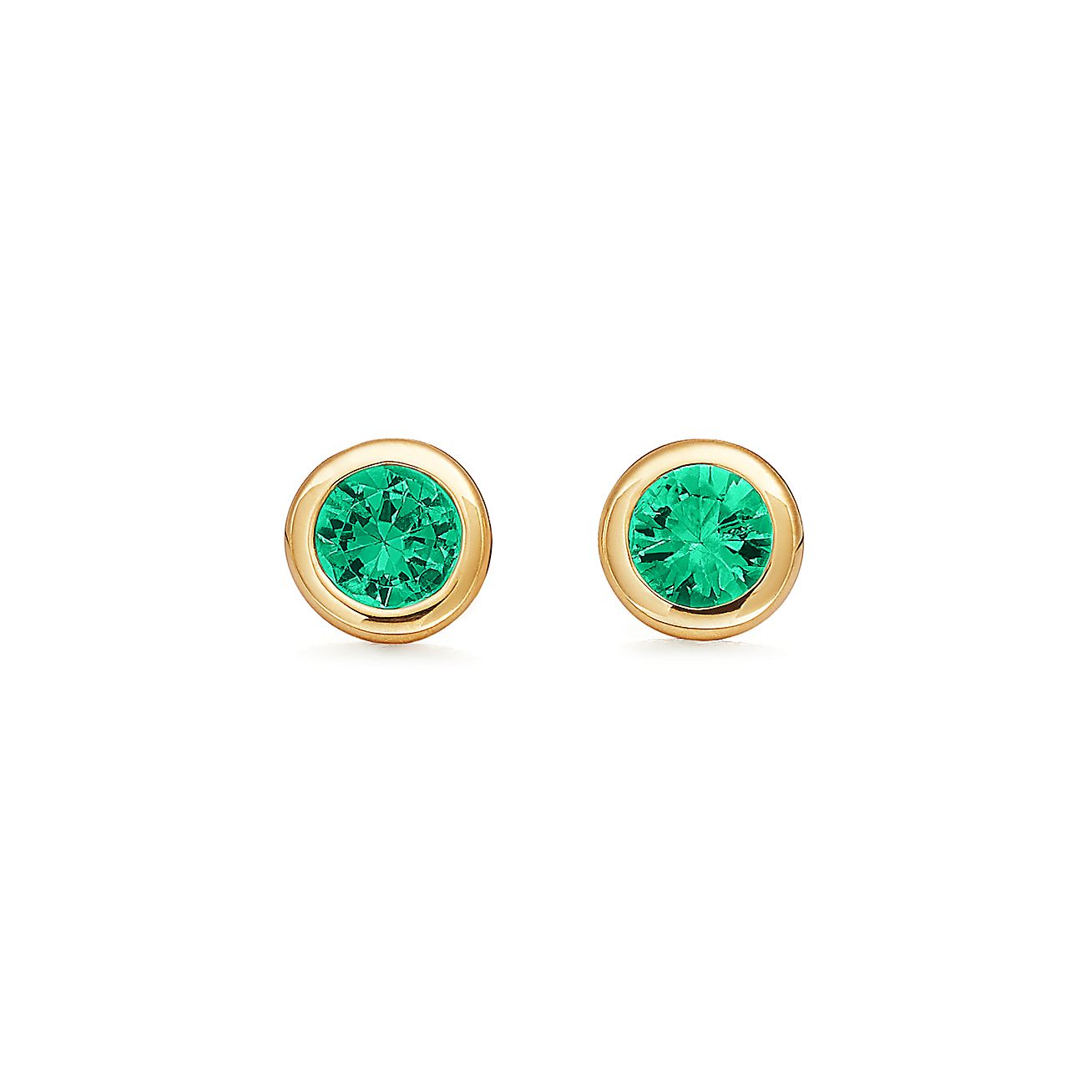 Elsa Peretti® Color by the Yard earrings in 18k gold with emeralds.