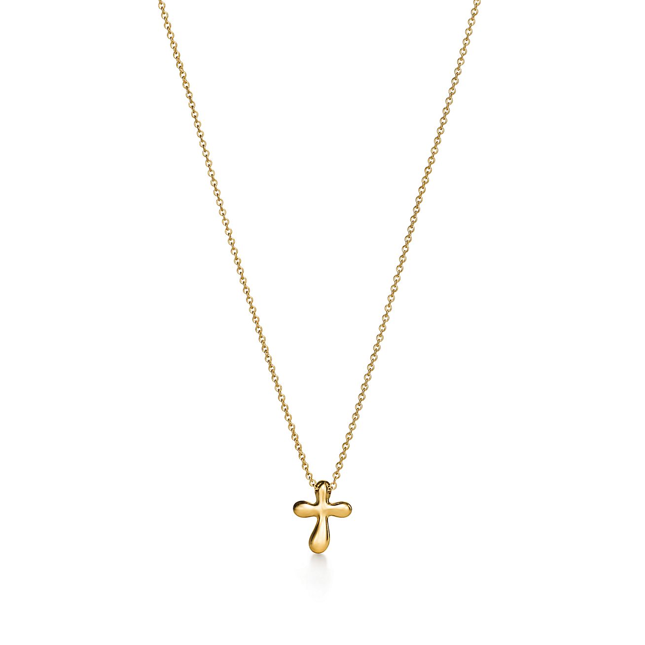 Elsa Peretti™ cross pendant in 18k gold, 12 mm wide. | Tiffany
