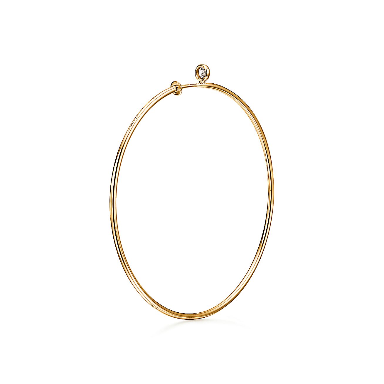 Elsa Peretti® Diamond Hoop single-row bangle in 18k gold with diamonds,  medium.