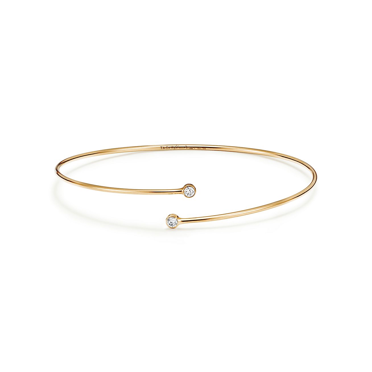 Elsa Peretti® Diamond Hoop single-row bangle in 18k gold with diamonds,  medium.
