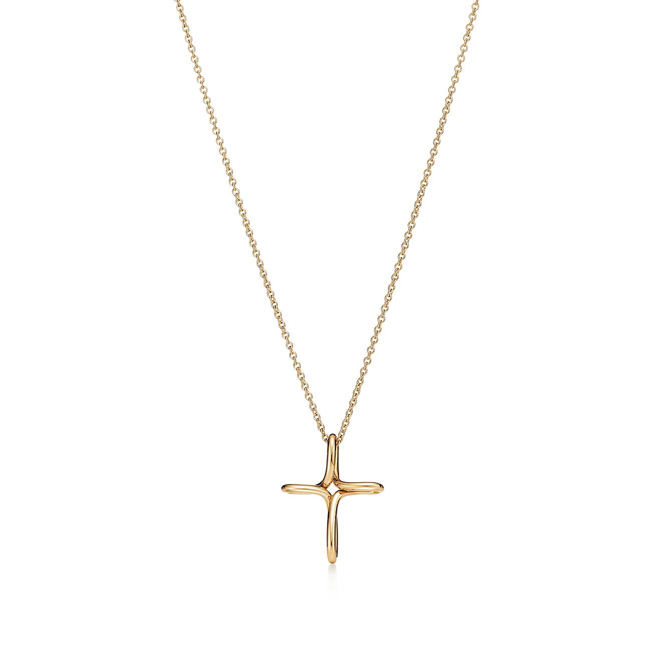 Elsa Peretti® infinity cross pendant in 18k gold, small. Tiffany & Co. CA