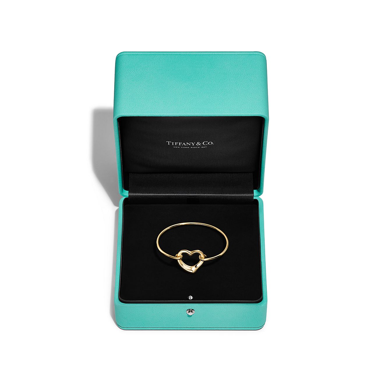 Elsa Peretti® Open Heart Bangle in Yellow Gold | Tiffany