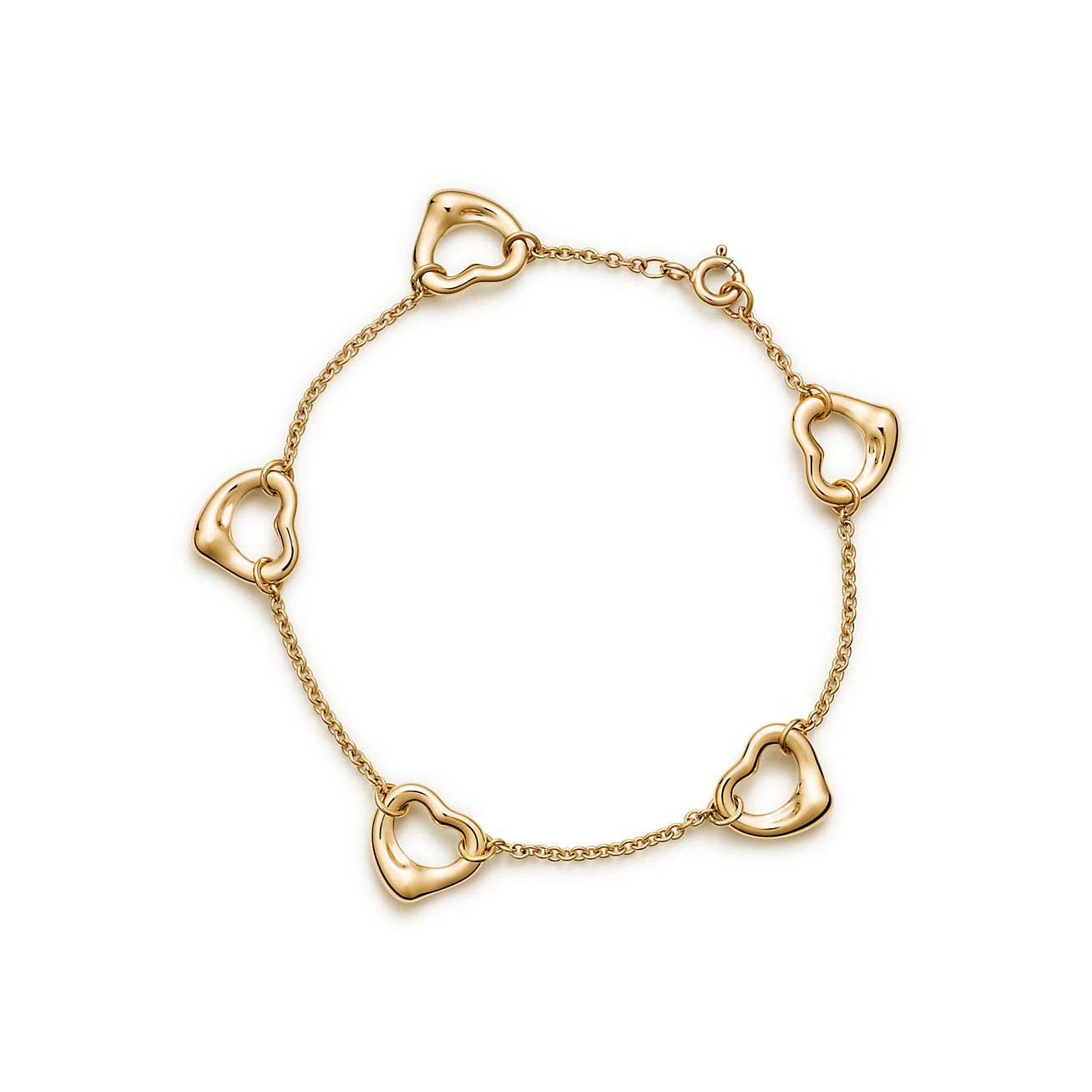 Tiffany Charm Bracelet 18 Carat Yellow Gold at 1stDibs | tiffany charm  bracelet gold, tiffany 750 bracelet, tiffany heart bracelet gold