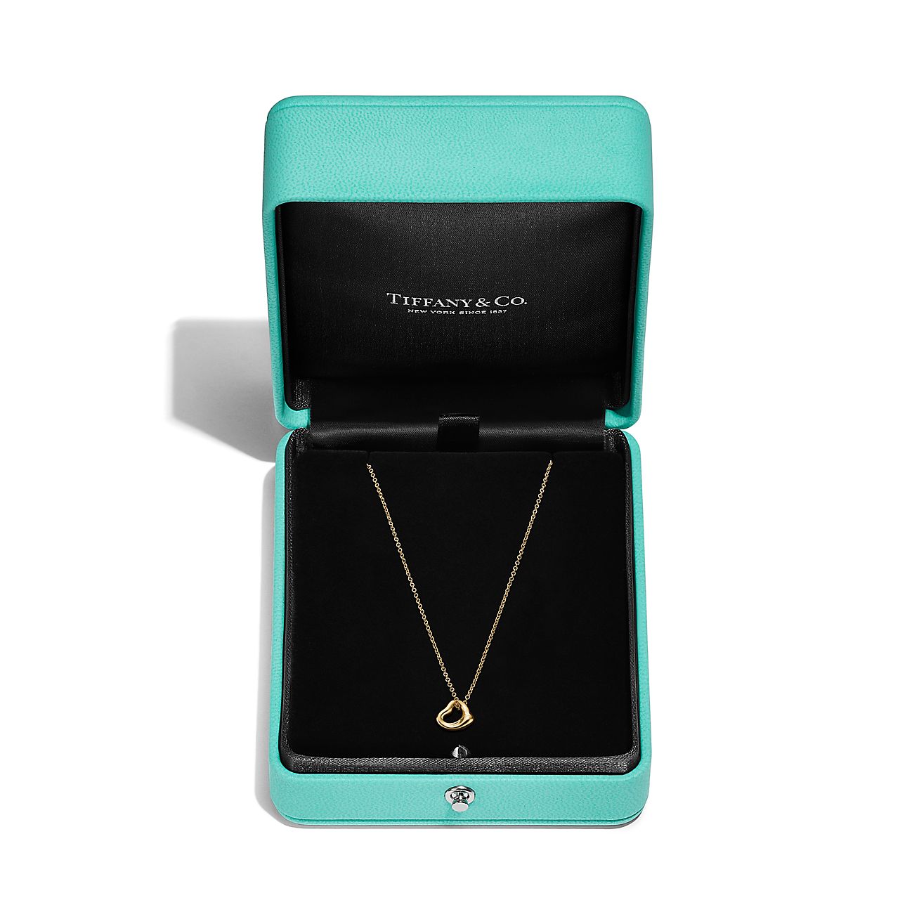 Elsa Peretti® Open Heart Pendant in Yellow Gold, 7 mm | Tiffany & Co. US