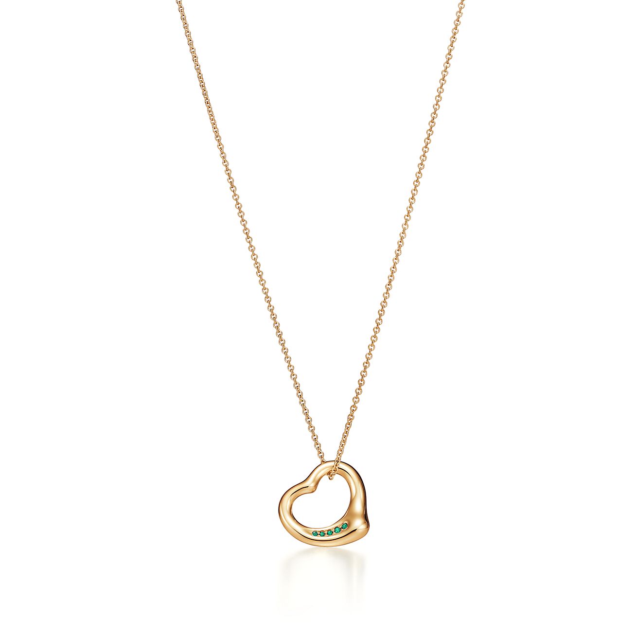 Elsa Peretti™ Open Heart Pendant in Yellow Gold with Emeralds, 16