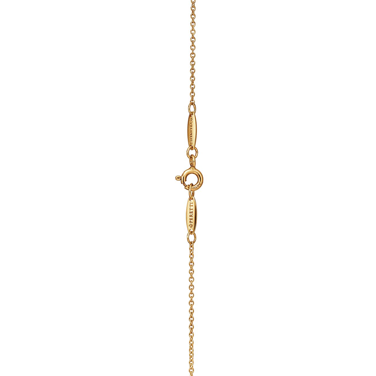 Elsa Peretti™ Open Heart pendant in 18k gold with diamonds, 11 mm 