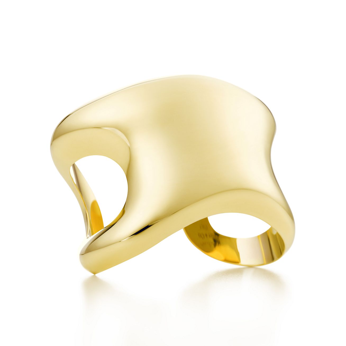 Elsa Peretti® open side cuff in 18k gold, medium. | Tiffany & Co.