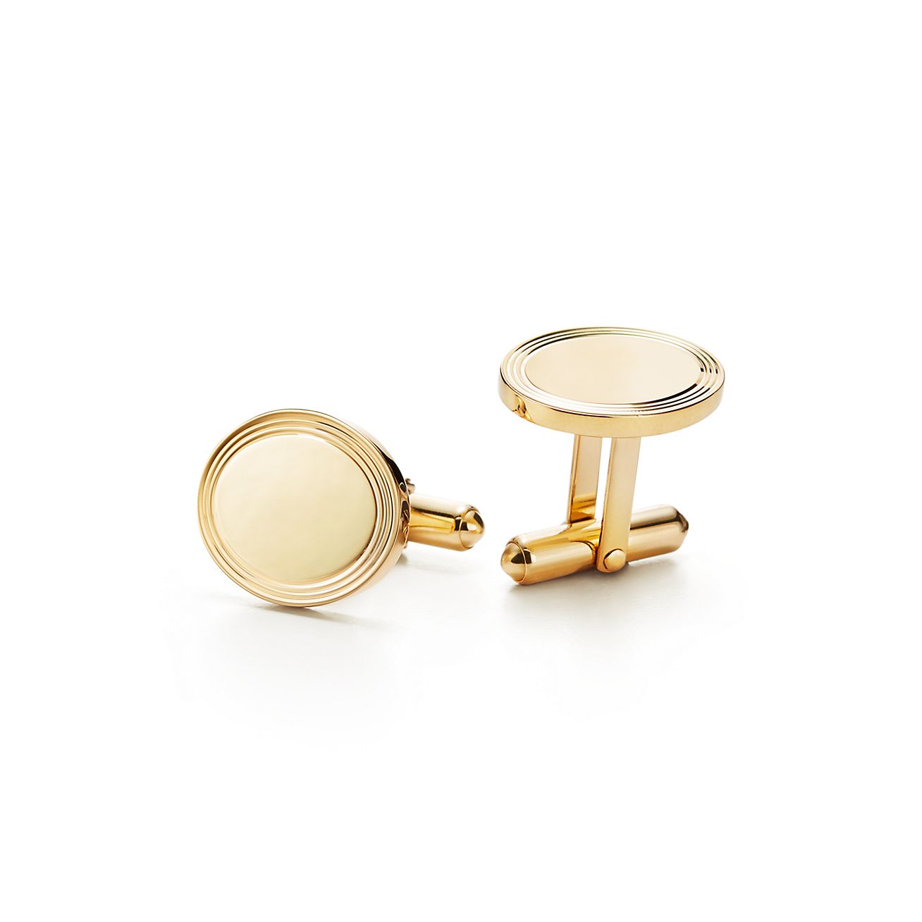 Engine-turned oval cuff links in 18k 