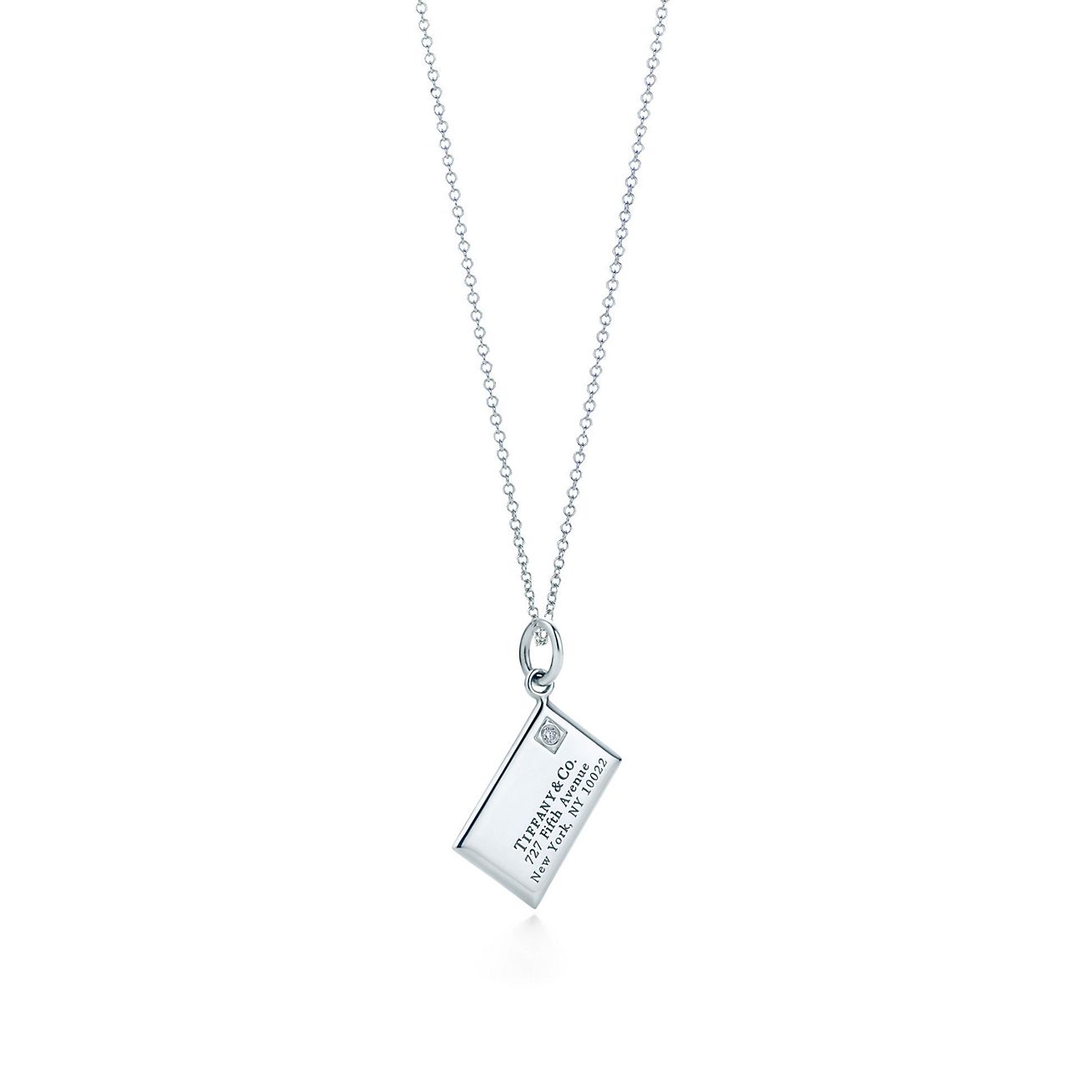 Envelope charm with a diamond in 