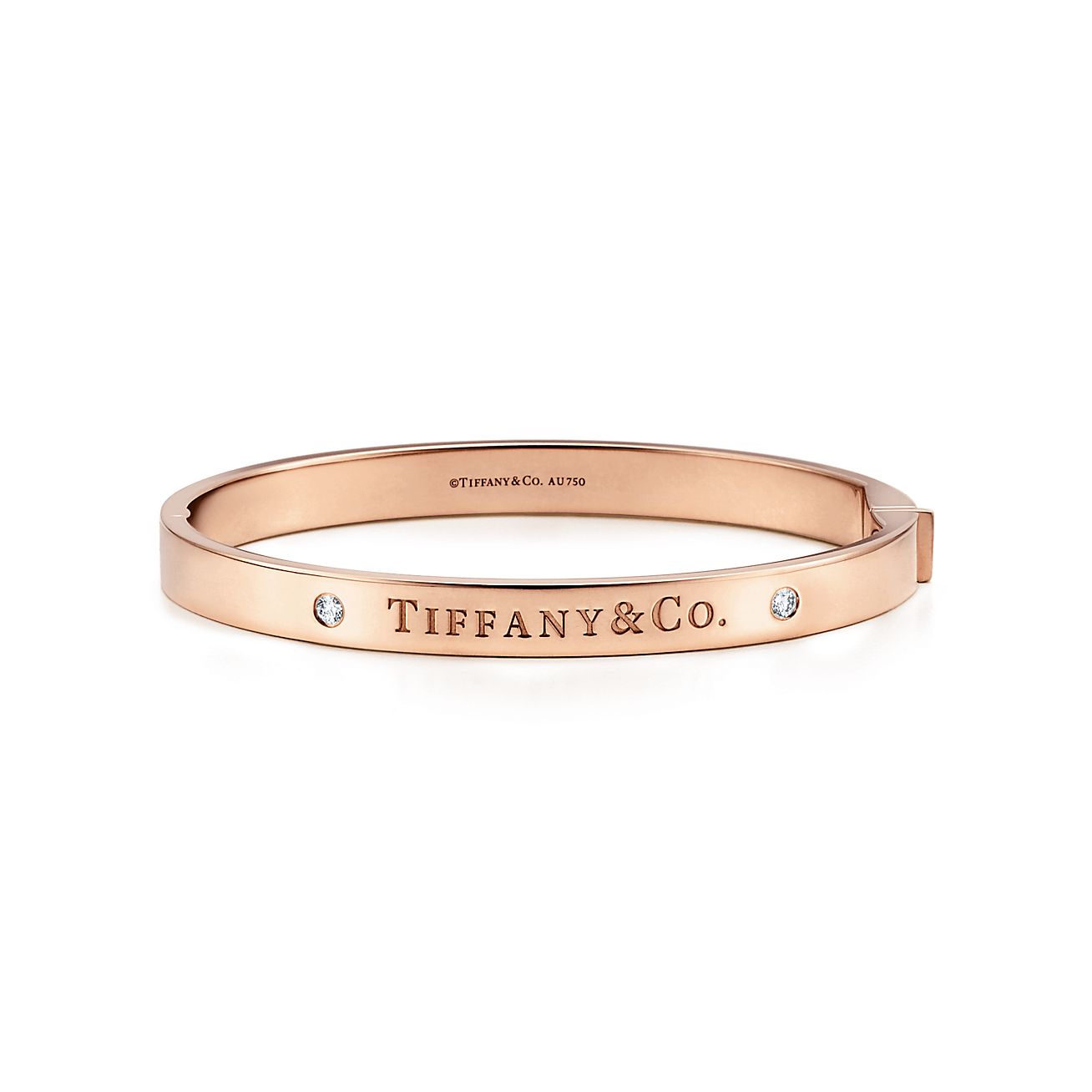 Hinged bangle in 18k rose gold with 