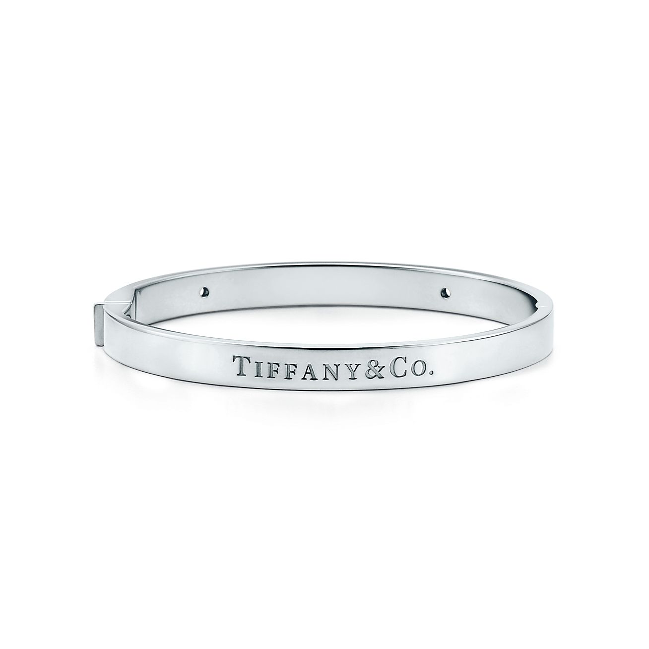 Hinged bangle in 18k white gold with 