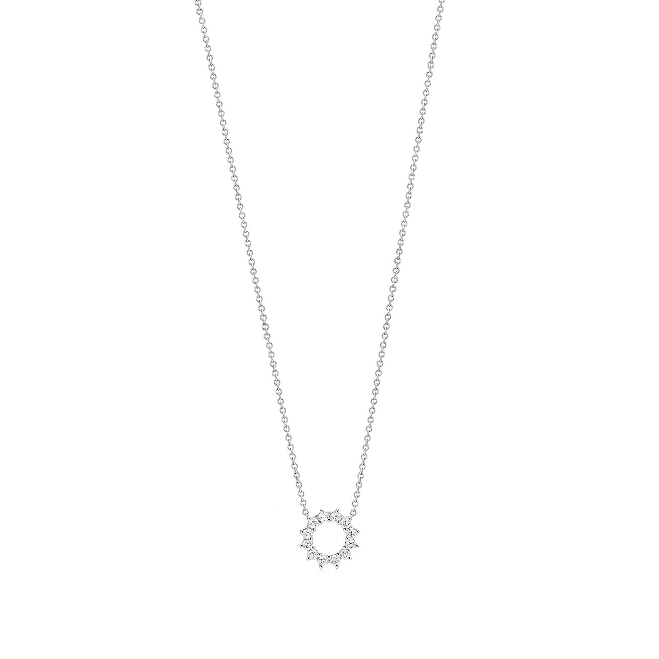 Open circle pendant in platinum with 
