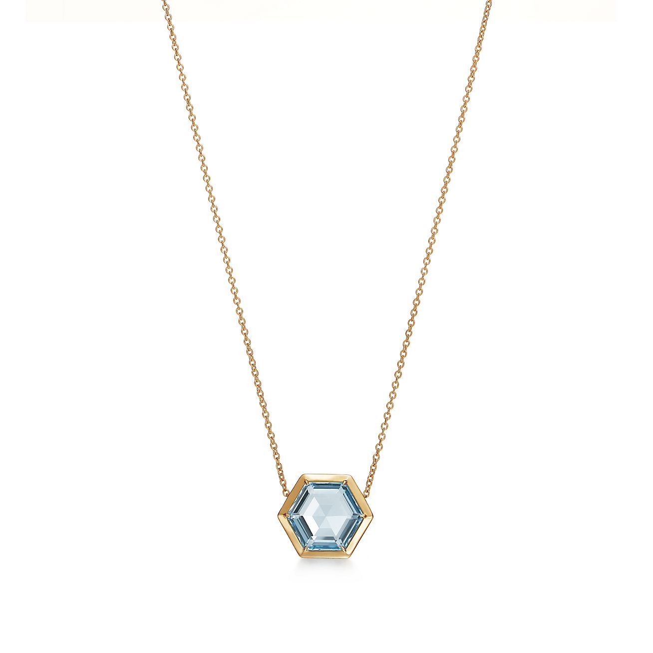 Paloma's Studio hexagon pendant in 18k gold with a blue topaz ...