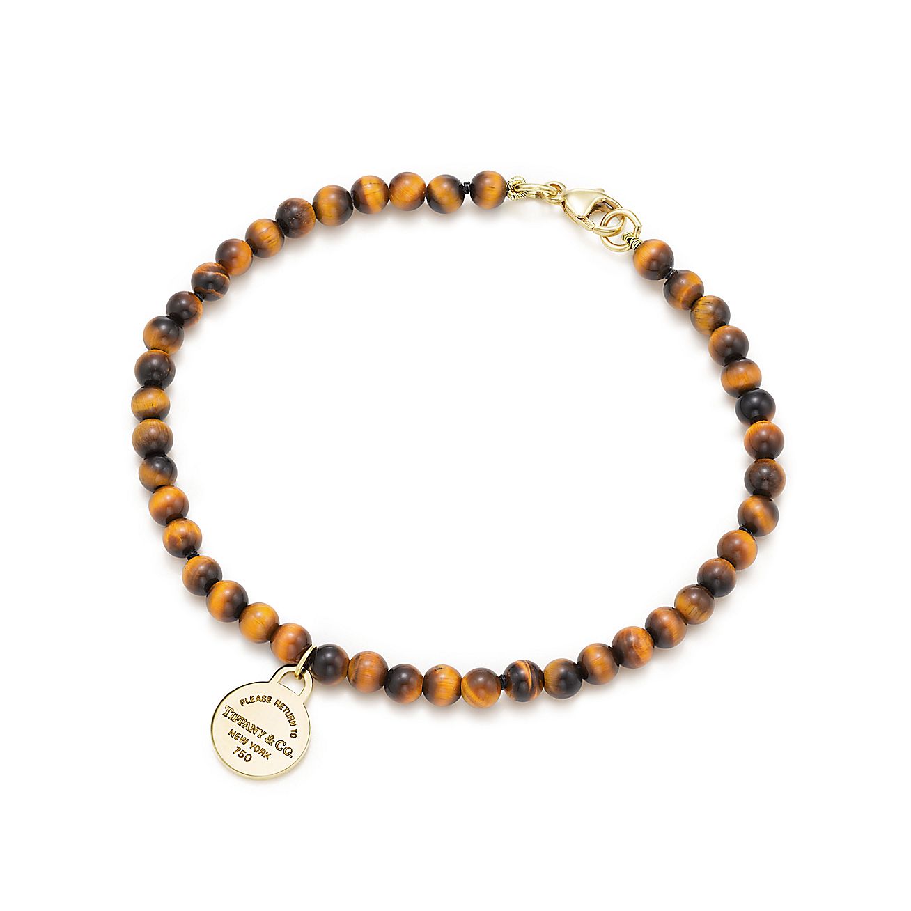 Return to Tiffany™ mini round tag in 18k gold on a tiger's eye bead ...