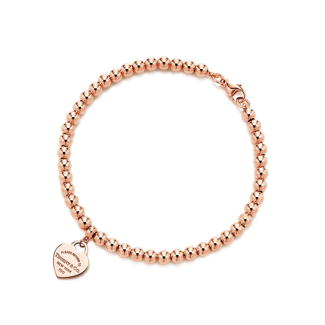 tag in 18k rose gold on a bead bracelet 
