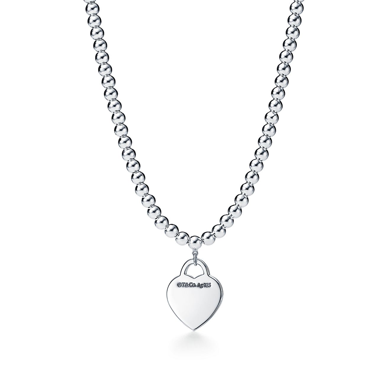 Return to Tiffany® small heart tag in sterling silver on a bead necklace.