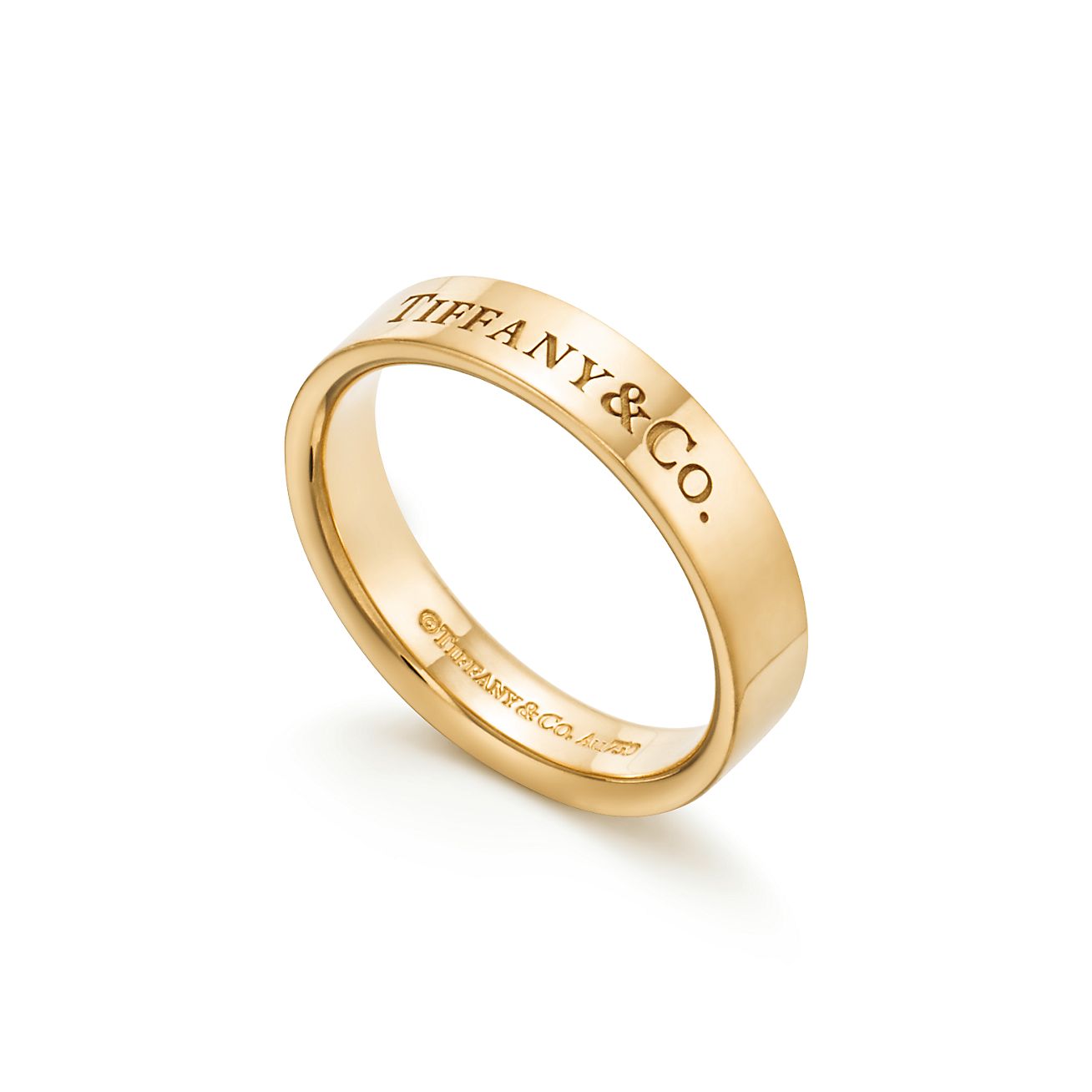 T&CO.® band ring in 18k gold, 4 mm. | Tiffany & Co. US T&CO.® band ring in 18k gold, 4 mm. | Tiffany & Co. US