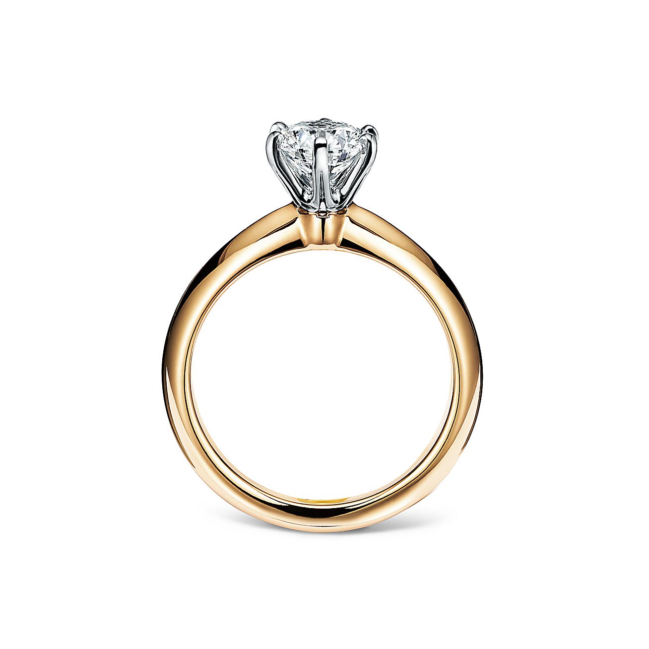 The Tiffany® Setting in 18k yellow gold world's most iconic engagement