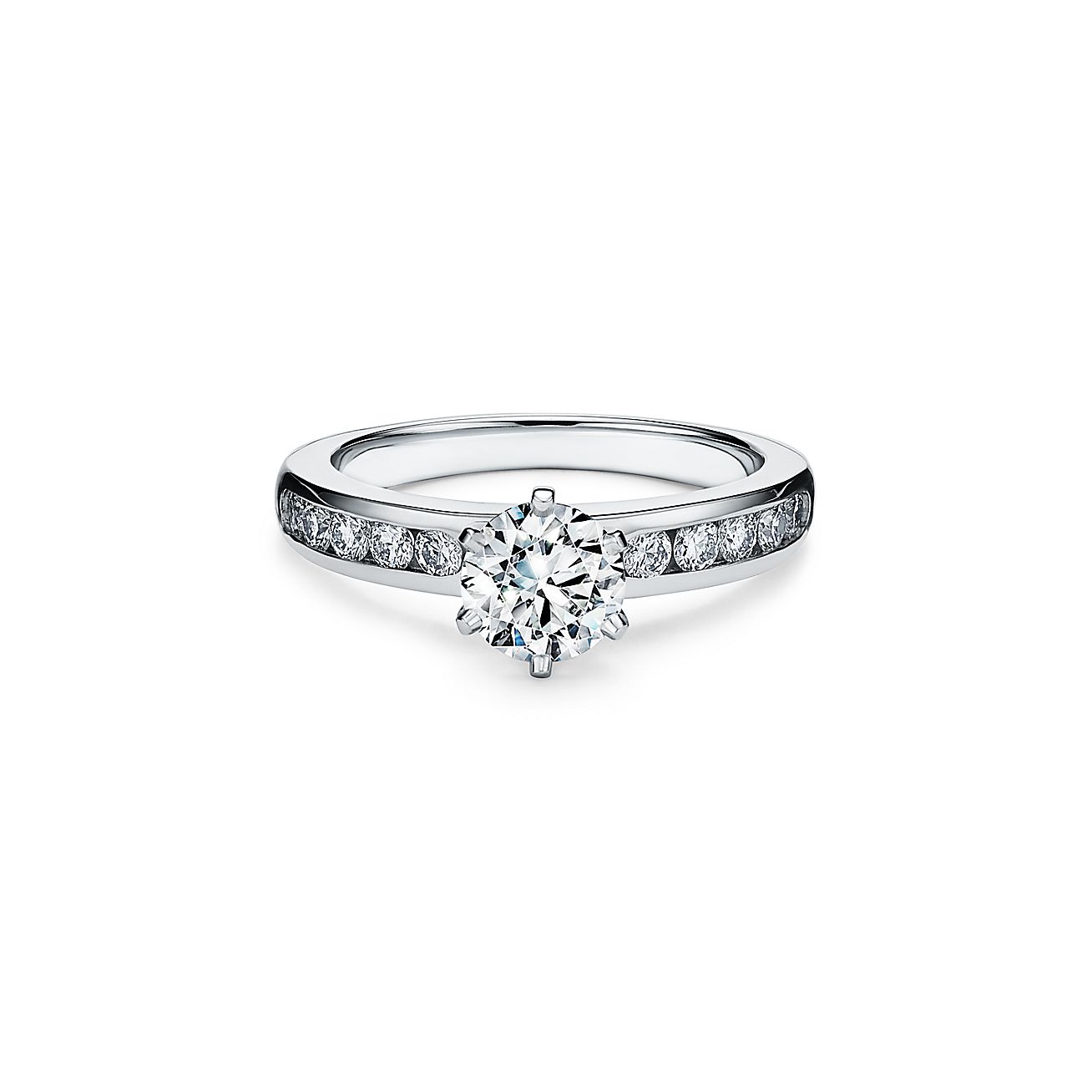 The Tiffany® Setting with a diamond band: world's most iconic engagement  ring.