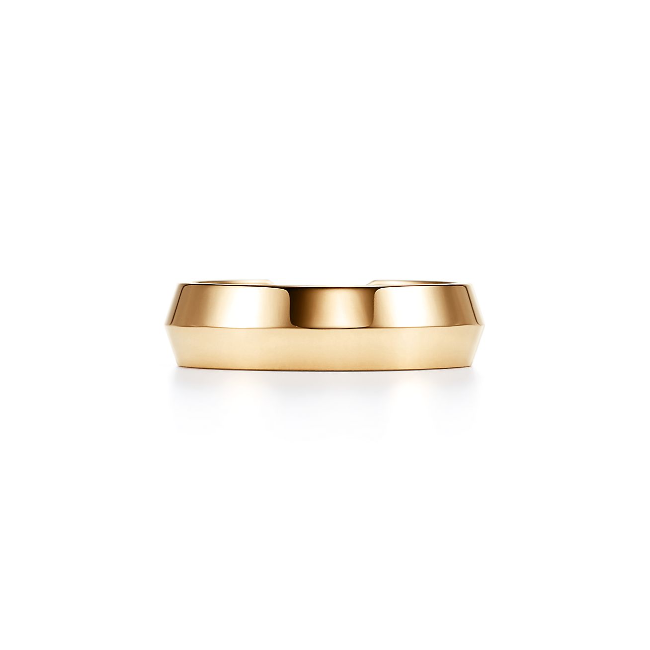 The Tiffany Setting nesting wide band ring in 18k gold 5.3 mm wide. Tiffany Co. US