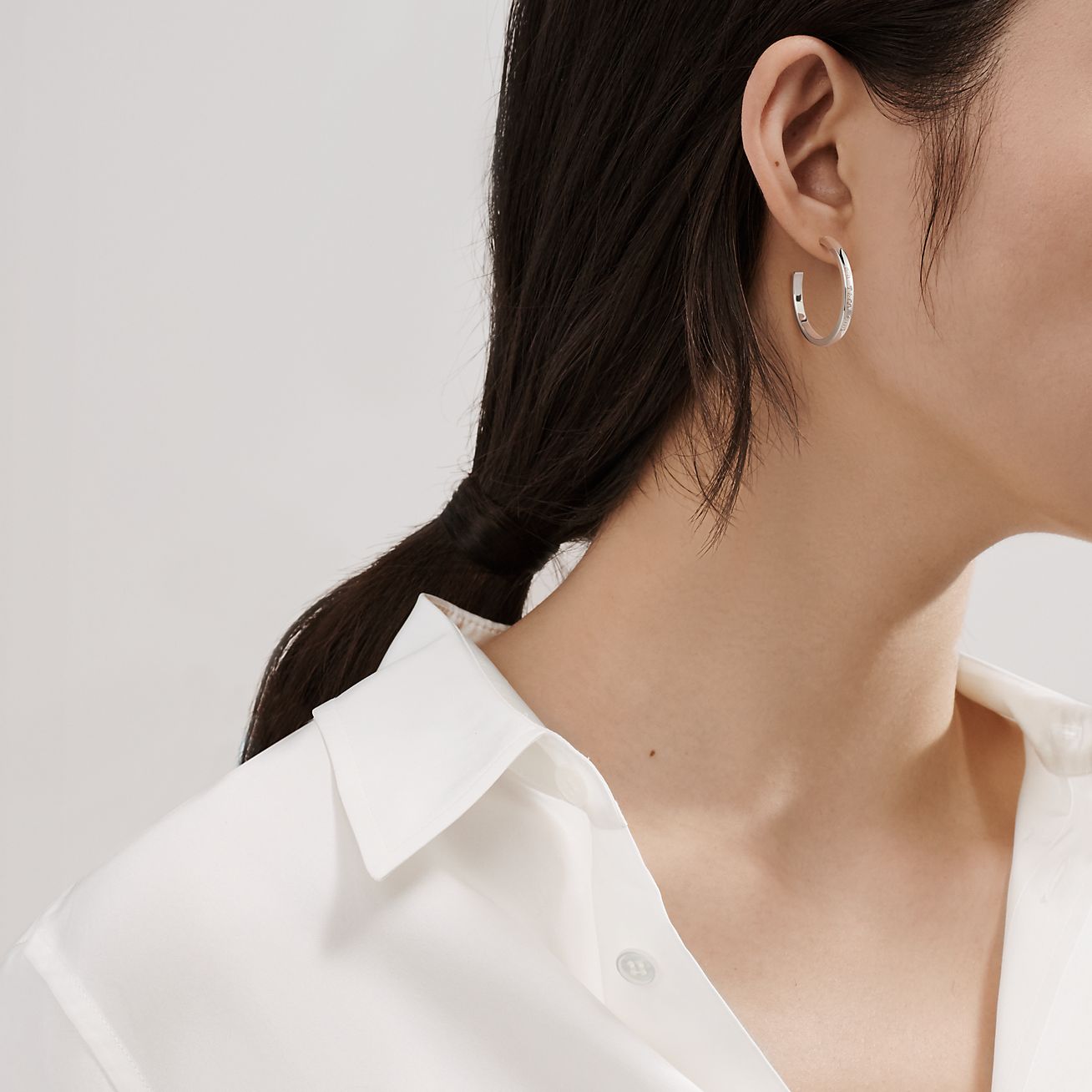 Tiffany Metro hoop earrings in 18k gold with diamonds small  Tiffany   Co