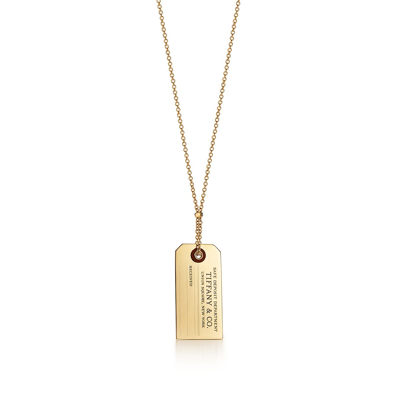 Tiffany Charms price tag pendant in 18k 