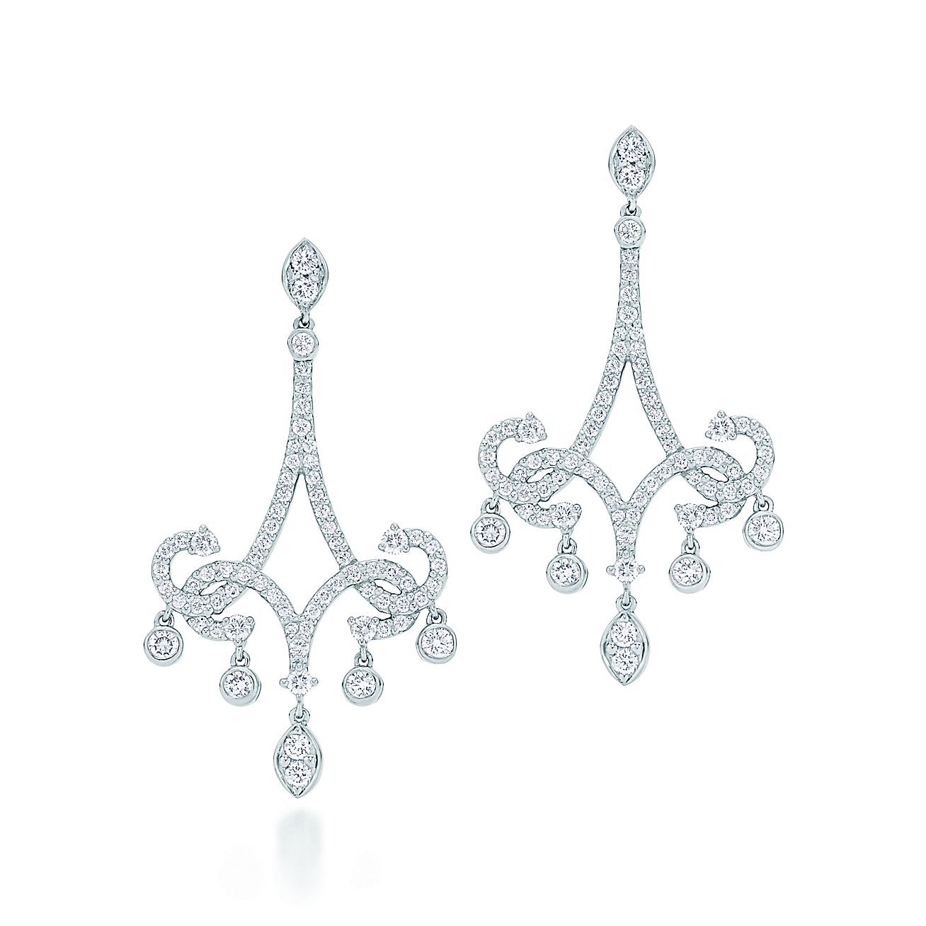 Tiffany Enchant® scroll earrings in platinum with diamonds. | Tiffany & Co.