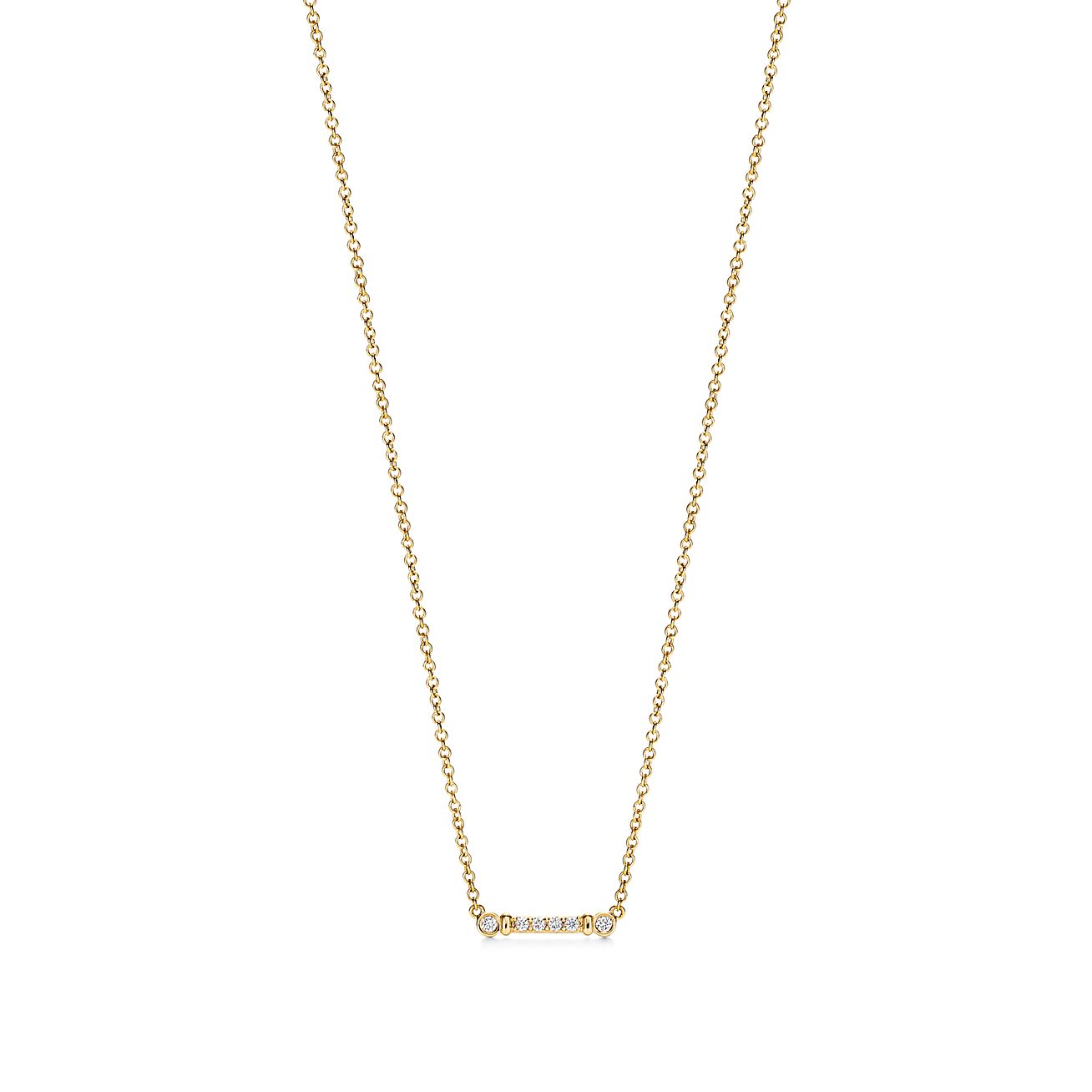 Tiffany T open vertical diamond bar pendant in 18k white gold. | Tiffany &  Co.