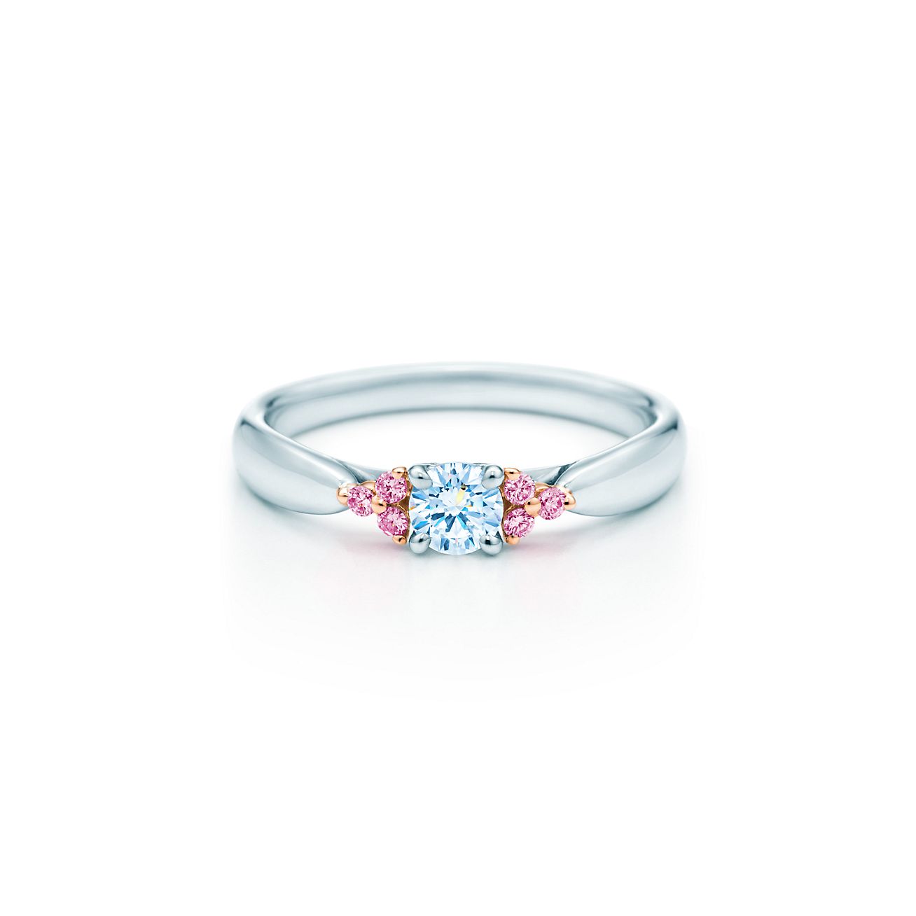 Fancy Pink diamond side stone ring in 