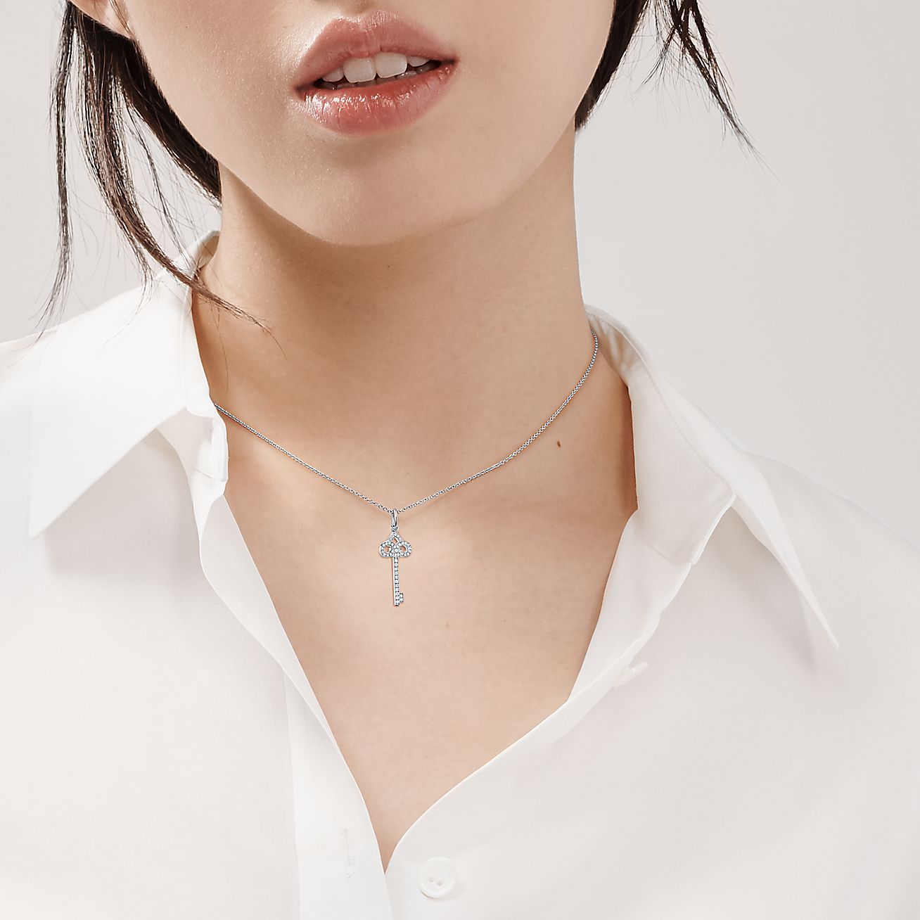 Tiffany & Co. Diamond Platinum Fleur De Lis Key Pendant Necklace