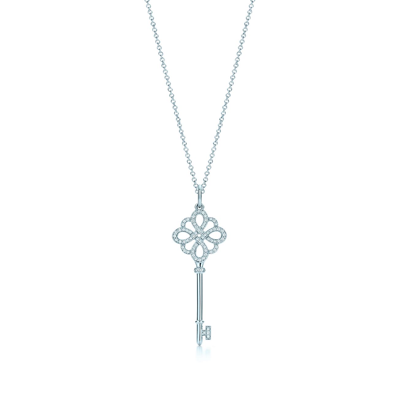 Tiffany Keys modern keys open round key pendant in 18k gold with diamonds,  mini.