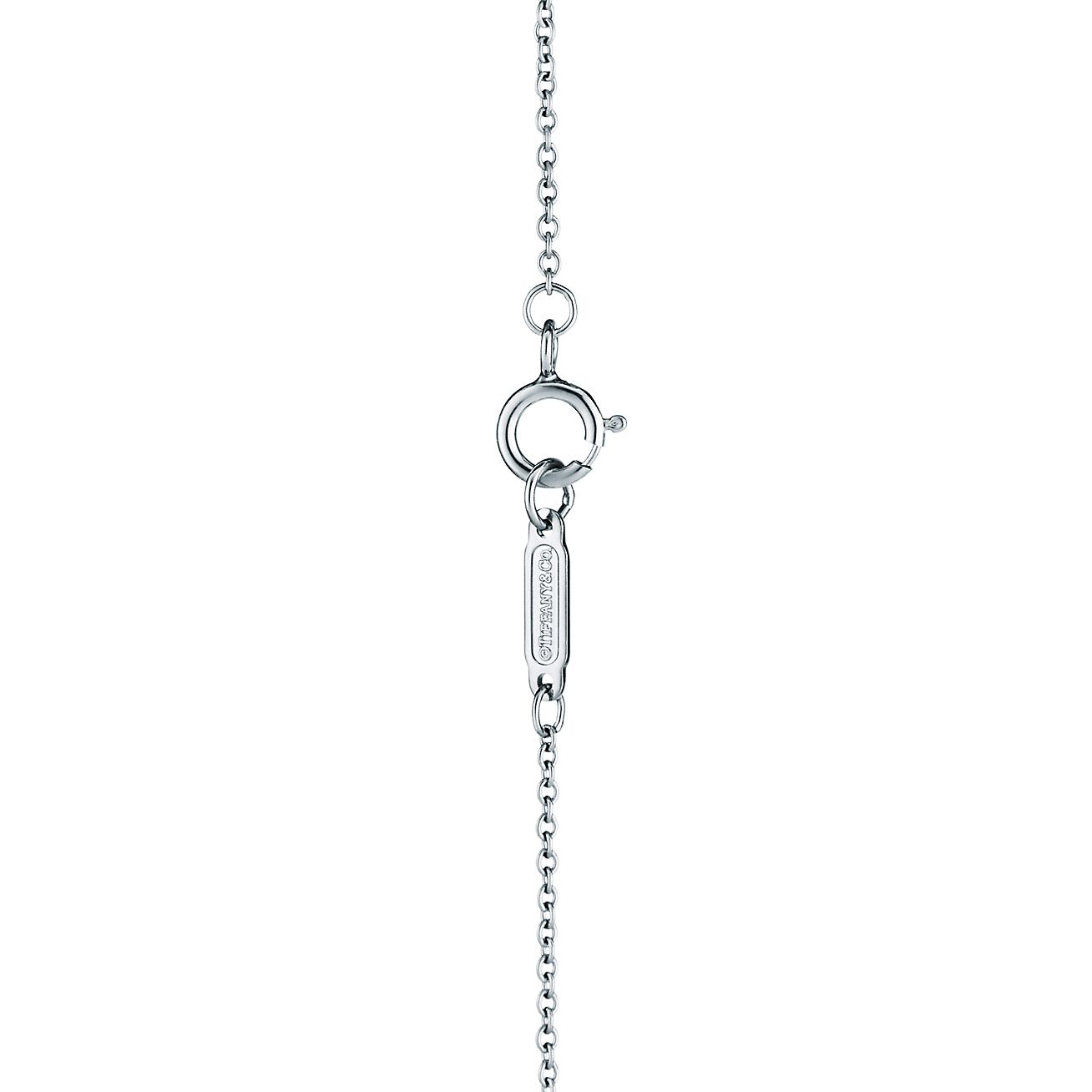 Tiffany Soleste pendant in platinum with diamonds and a tanzanite. - Alternate shot 1 - Alternate shot 2