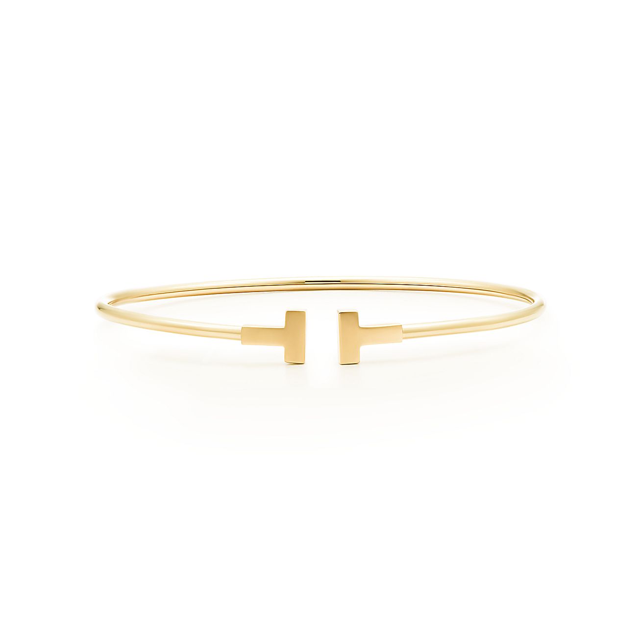 Tiffany T narrow wire bracelet in 18k gold, medium. | Tiffany & Co.