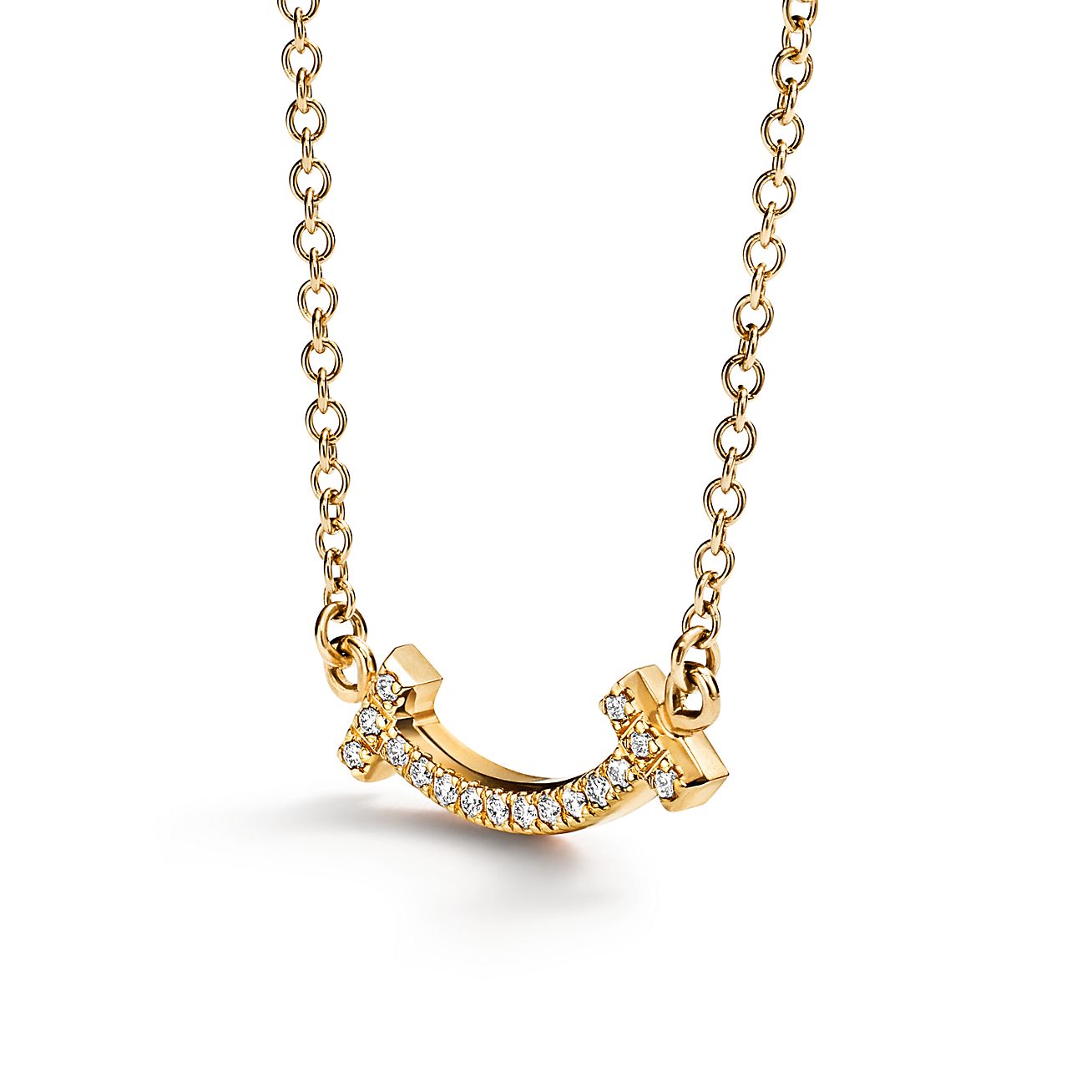 Tiffany T smile pendant in 18k gold with diamonds, mini. | Tiffany 