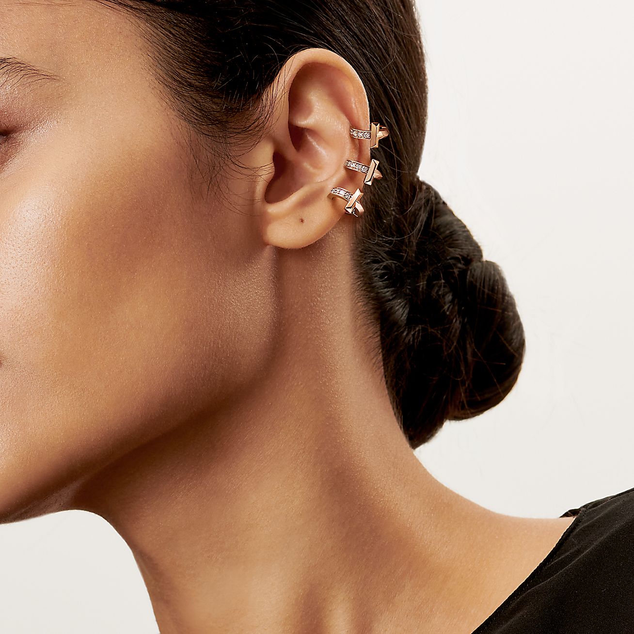 Tiffany T T1 Ear Cuff in Rose Gold with Diamonds - Alternate shot 1 - Alternate shot 2 - Alternate shot 3 - Alternate shot 4 - Alternate shot 5 - Modal shot 1