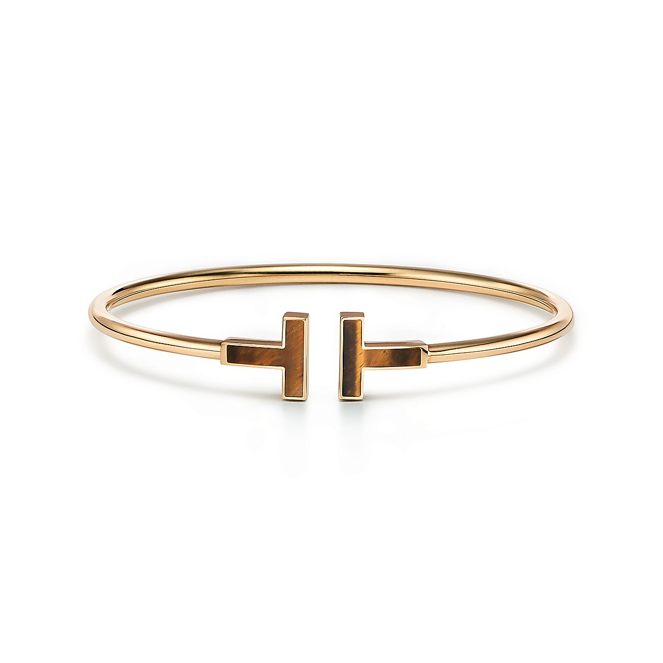Tiffany T tiger's eye wire bracelet in 18k gold, large. | Tiffany & Co.