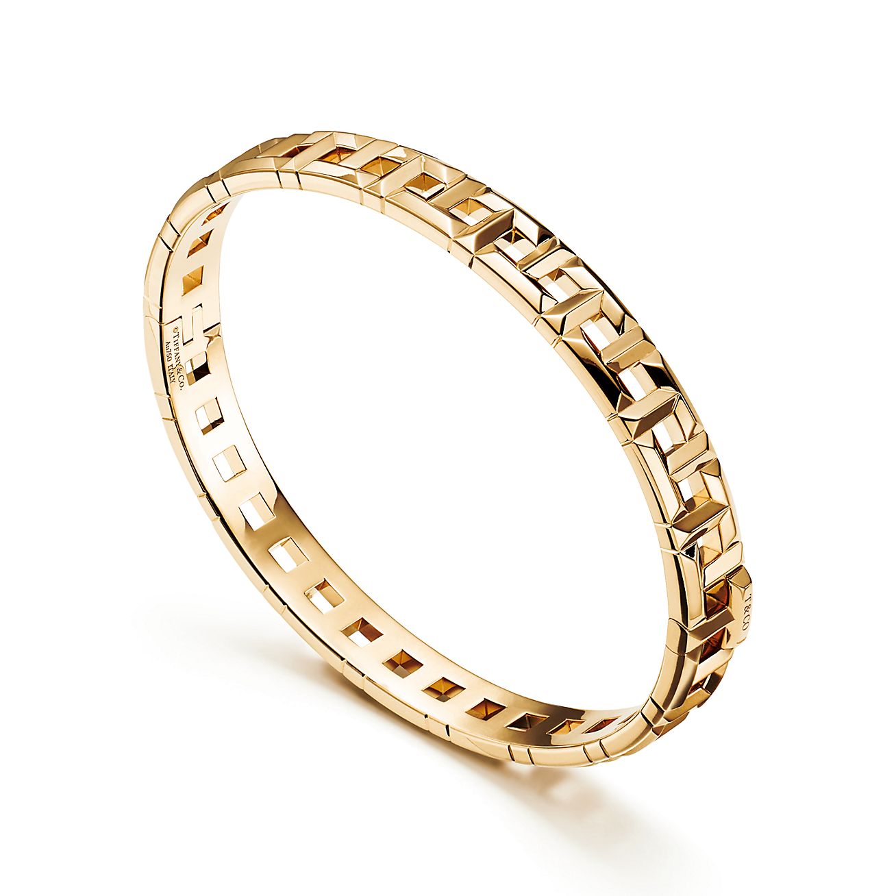 Tiffany T True narrow hinged bangle in 18k gold, large. | Tiffany