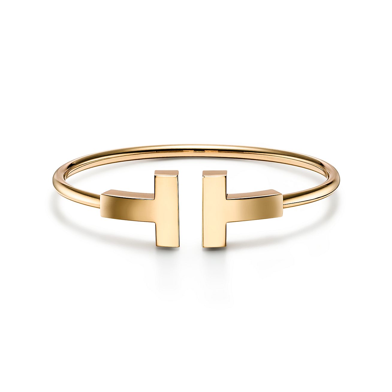 veld pk Als reactie op de Tiffany T wide wire bracelet in 18k gold, medium. | Tiffany & Co.
