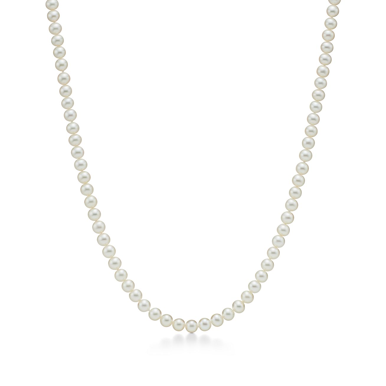 Ziegfeld Collection pearl necklace with a silver clasp and decorative tag,  6-7 mm.