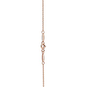 Elsa Peretti® infinity cross pendant in 18k rose gold, small
