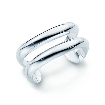 A SET OF TWELVE SILVER NAPKIN RINGS, DESIGNED BY ELSA PERETTI FOR TIFFANY &  CO., NEW YORK, LATE 20TH CENTURY, Dining IN, New York, 2020