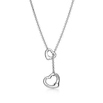 Elsa Peretti® Open Heart pendant in platinum with diamonds, 11 mm wide. |  Tiffany & Co.