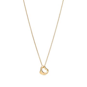 Elsa Peretti® Open Heart Pendant in Yellow Gold, 11 mm | Tiffany & Co. US