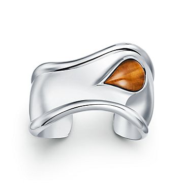 Elsa Peretti® small Bone cuff in sterling silver with tiger's eye, 43 mm