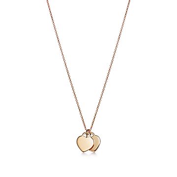 Return to Tiffany® mini double heart tag pendant in 18k gold.
