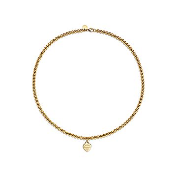 Gold necklace with small beads outlet